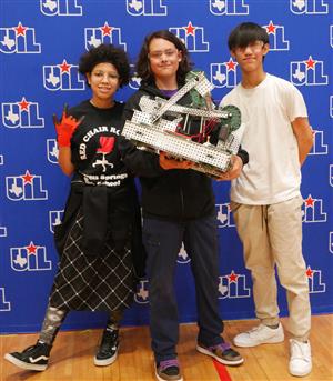 3 Cy Ridge students with their robot